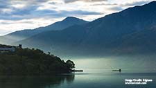 eautiful landscape of lake level reflect fantasy dramatic sunrise sky in Sun Moon Lake , in Taiwan, Asia.